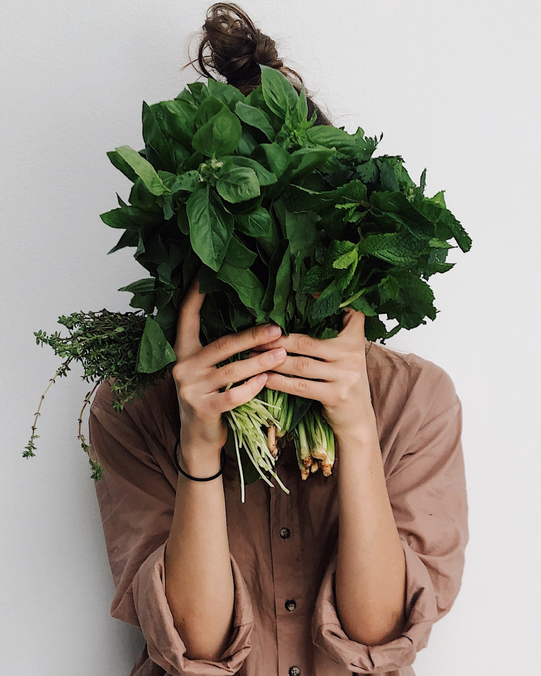 woman with green vegetables